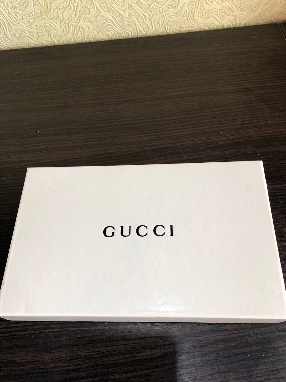 Чёрное портмоне Gucci