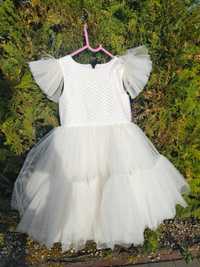 Biała sukienka weselna