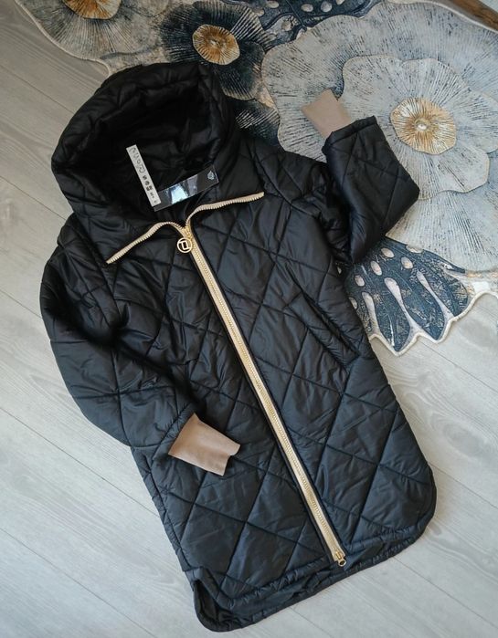 Długa kurtka zimowa z mankietami syntetycznymi