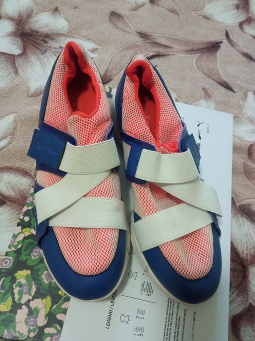 Кроссовки Merrell и Calvin Klein.