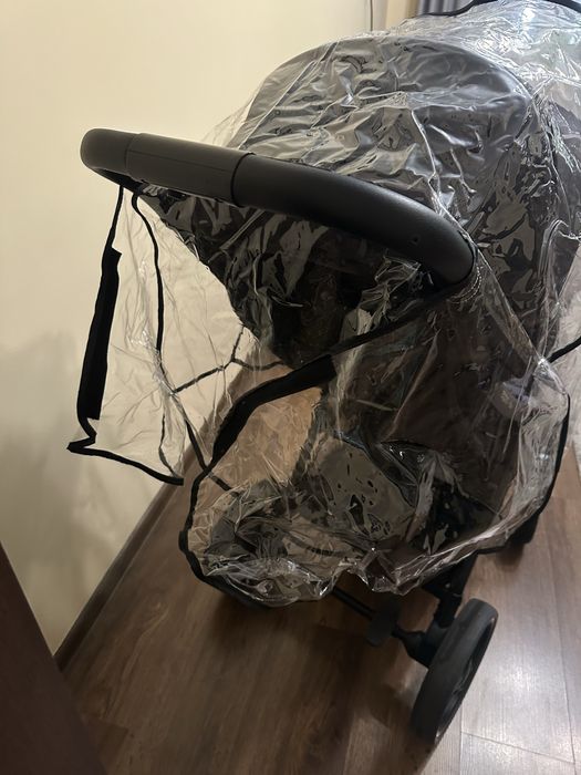 Дощовик на прогулянкову коляску