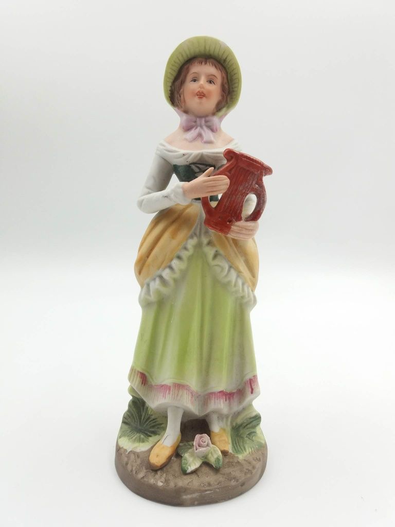 Śliczna porcelanowa figurka damy