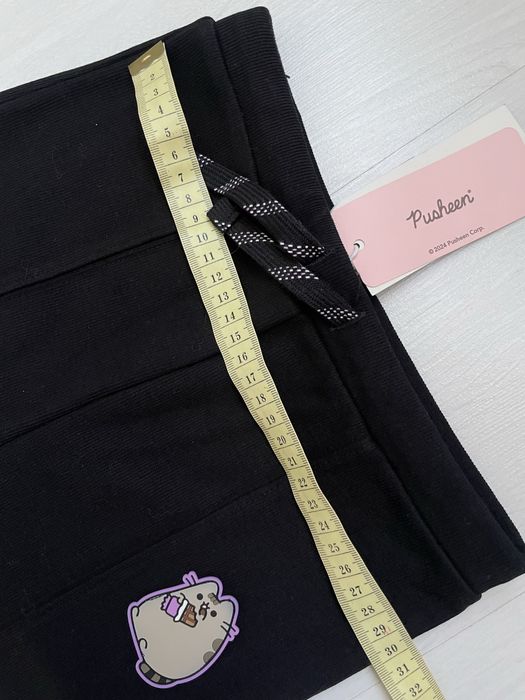 Штани клеш в рубчик