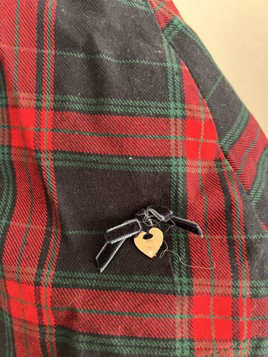 Saia de criança tipo colegial Ativo