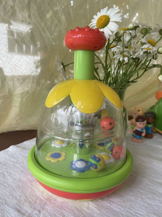 Іграшка дзига Chicco