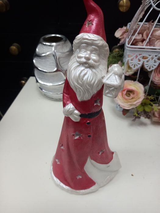 Pai natal em louça  que dá luz