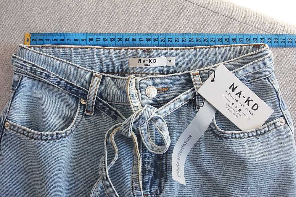 Jeansy damskie NA-KD Slouchy dzwony flare mom jeans spodnie jeansowe