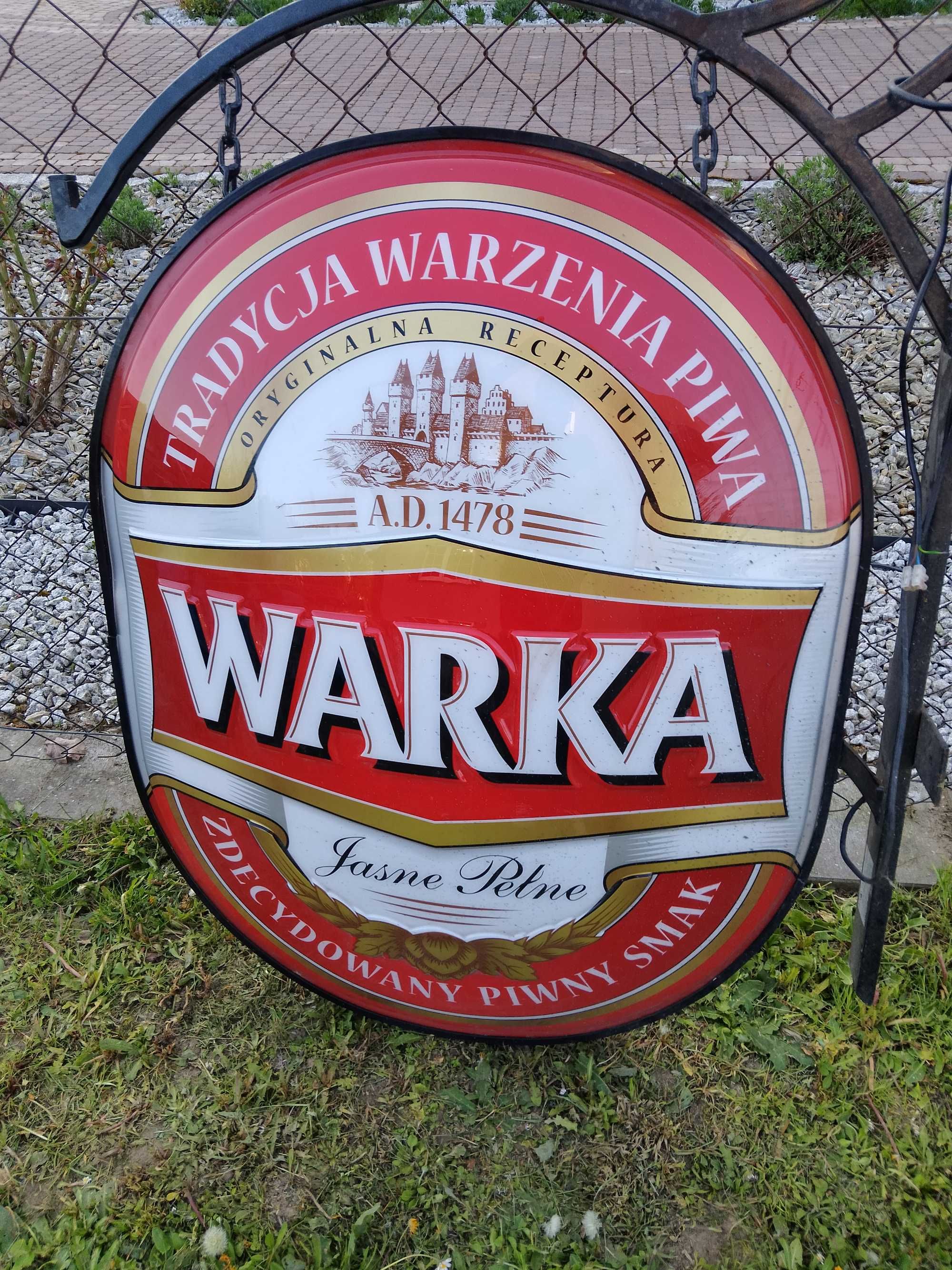 Reklama, neon świetlny piwa Warka