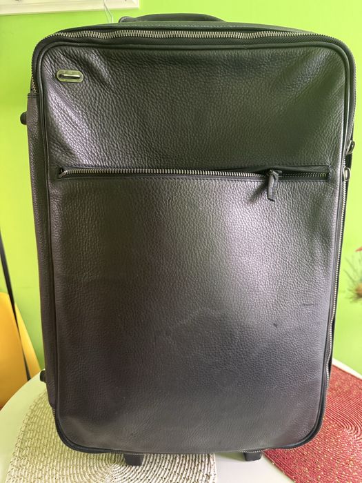 Używana, skórzana walizka, wymaga naprawy składanego uchwytu