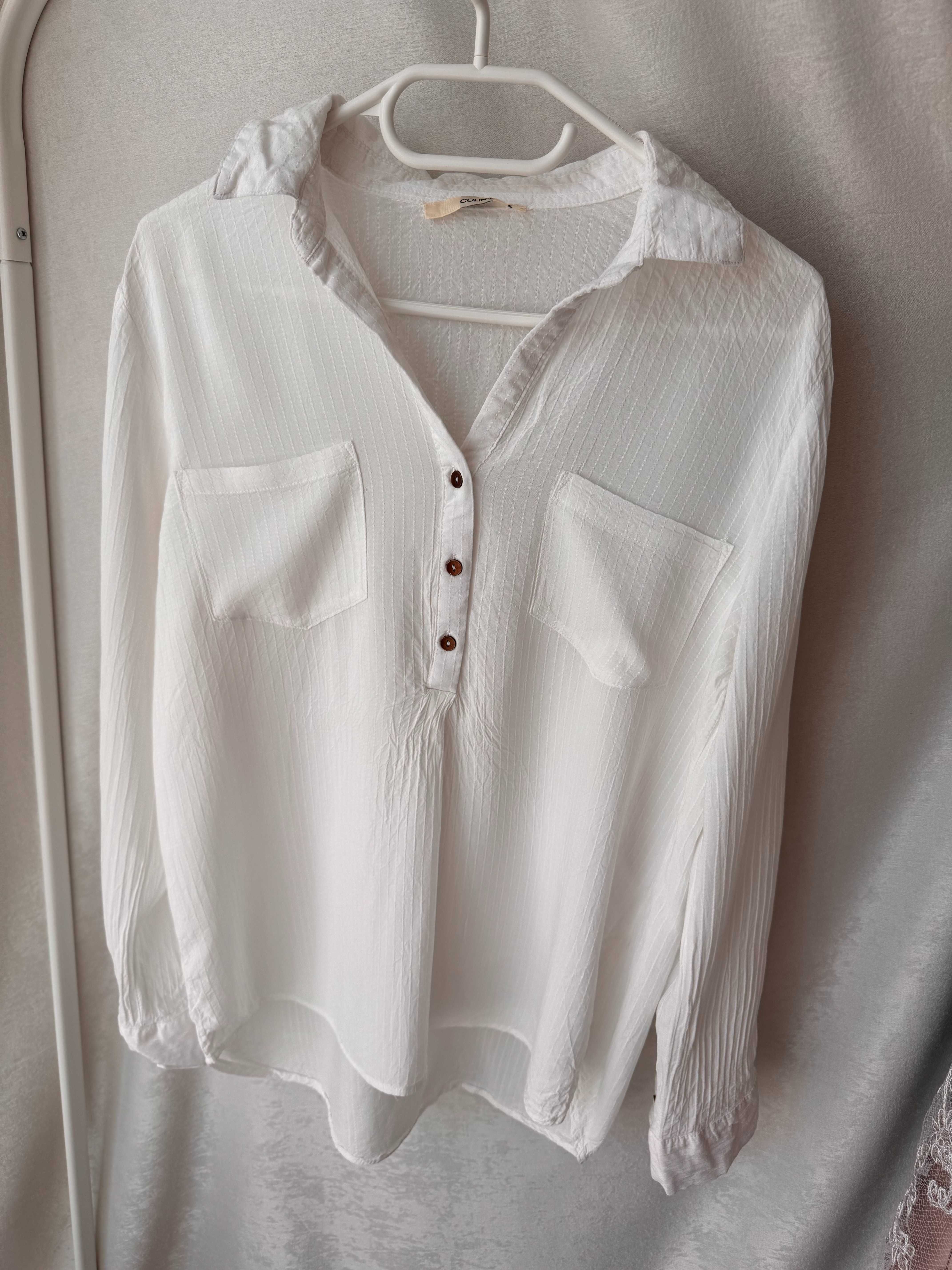 Біла блуза з мусліну