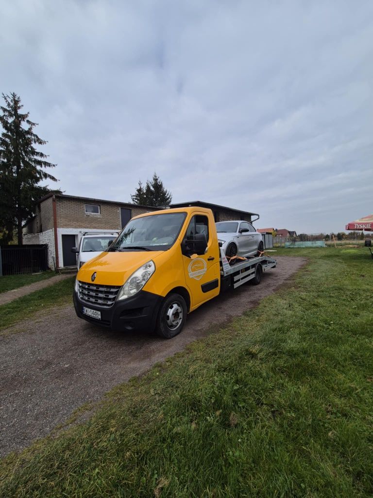 Pomoc drogowa laweta transport aut maszyn autolaweta transport busów