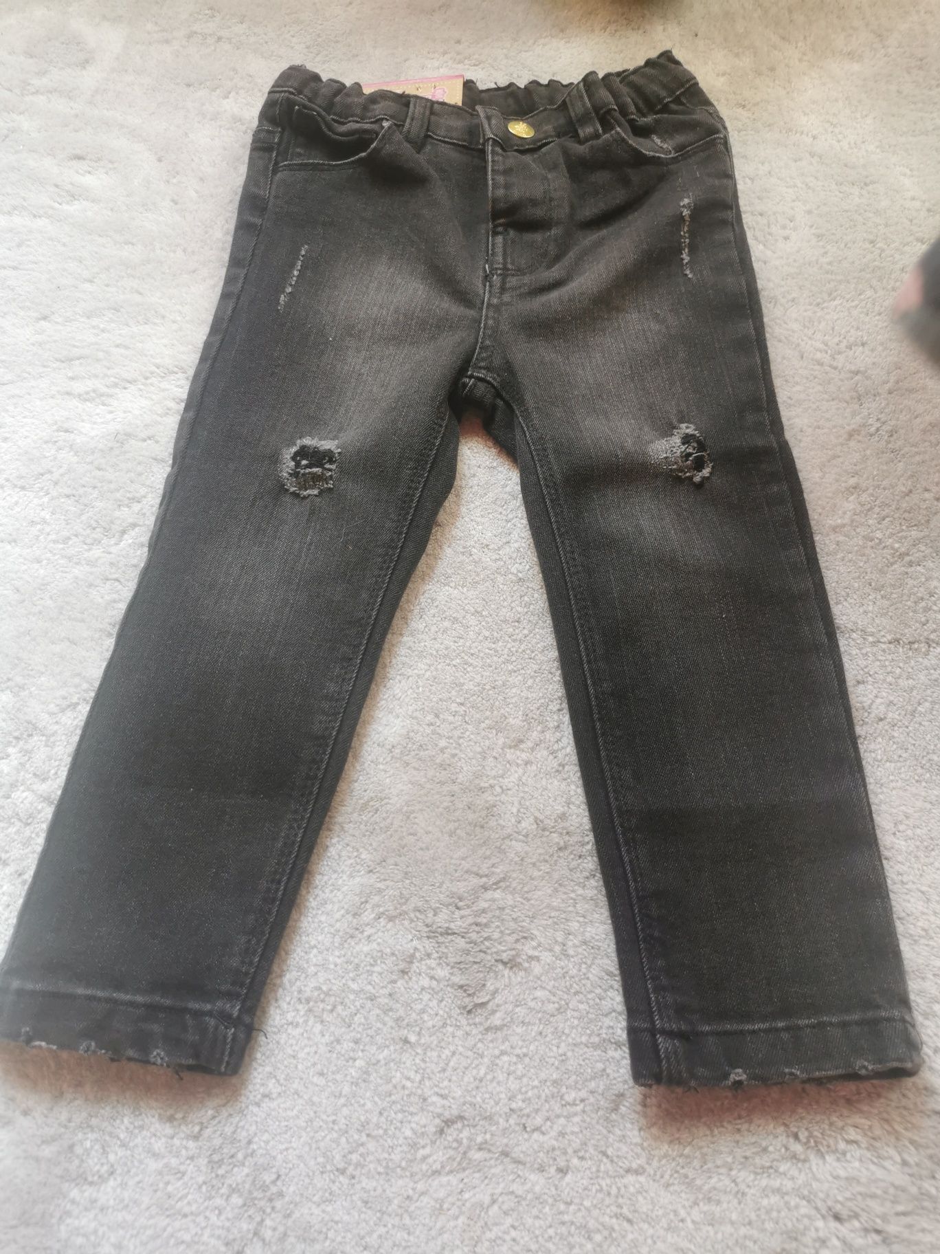 Nowe czarne jeansy 92