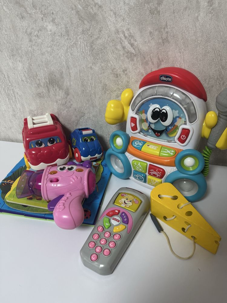 Дитячі іграшки пазли chicco fisher price