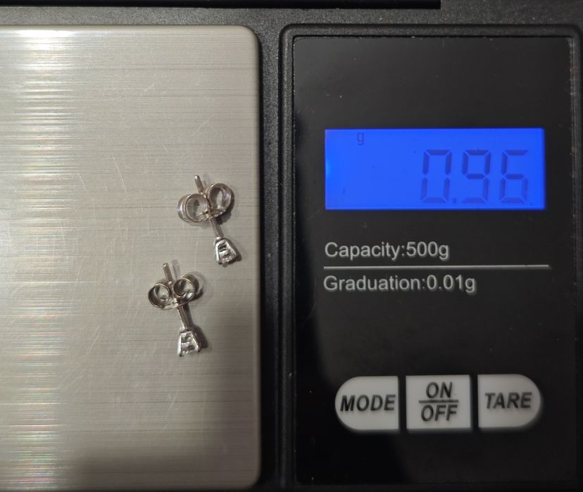 Золоті сережки з діамантами 0.2 ct, 750 проба.