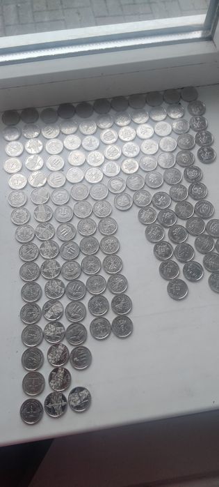 Монети 10 грн ..