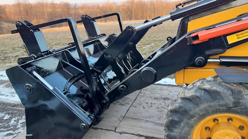 Koparko-ładowarka CAT 428D JCB CASE VOLVO