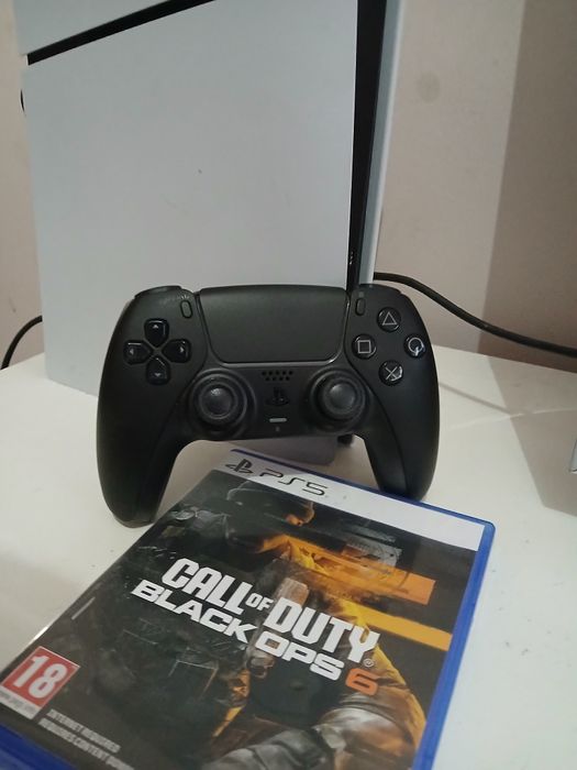 Ps5 slim strandard 1 tb garantia até julho 2028 + black ops 6