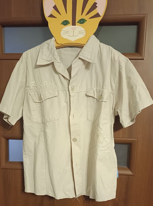 Koszula chłopieńca z krótkim rękawkiem firmy Restys.