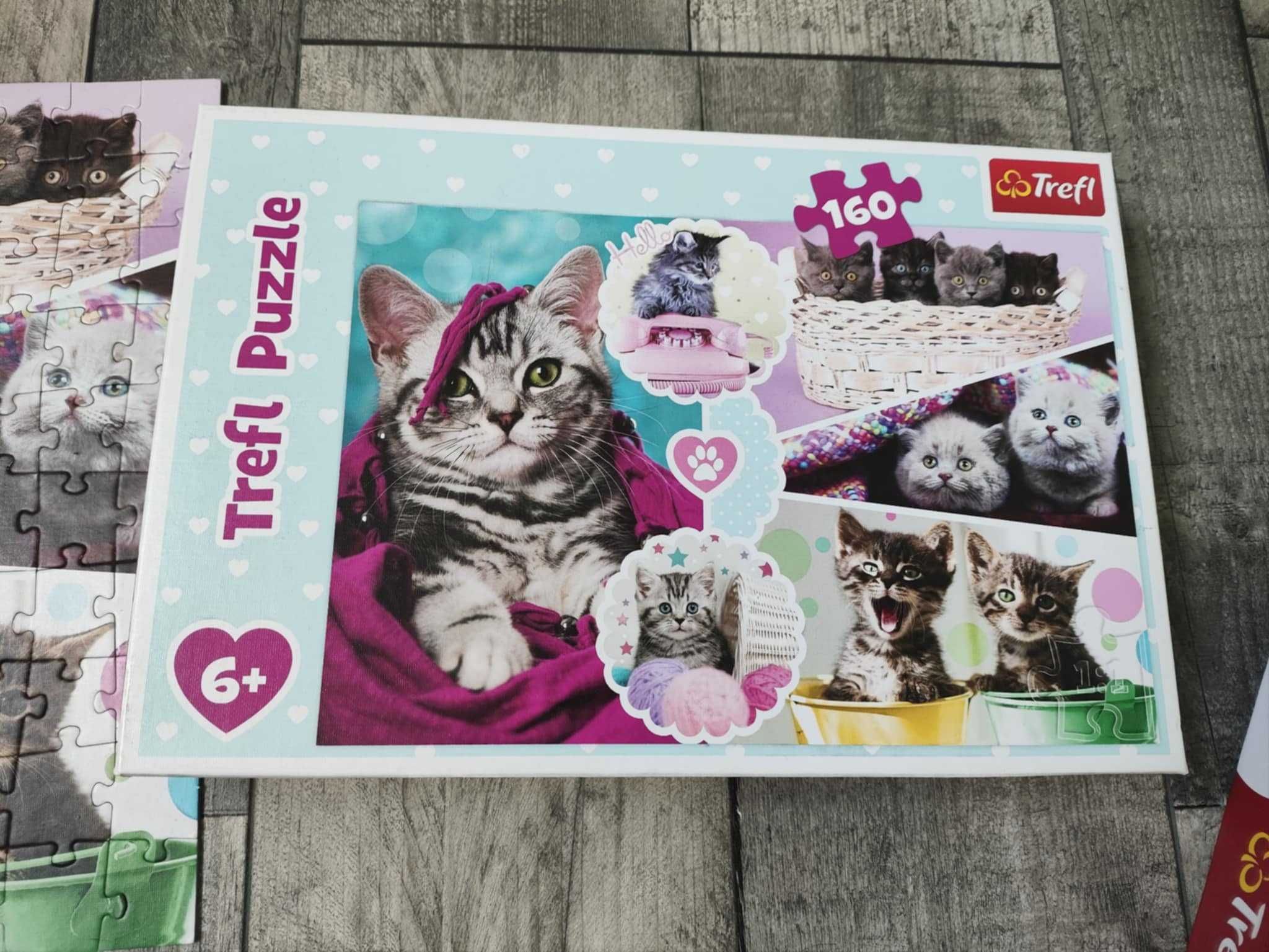 Trzy zestawy puzzli