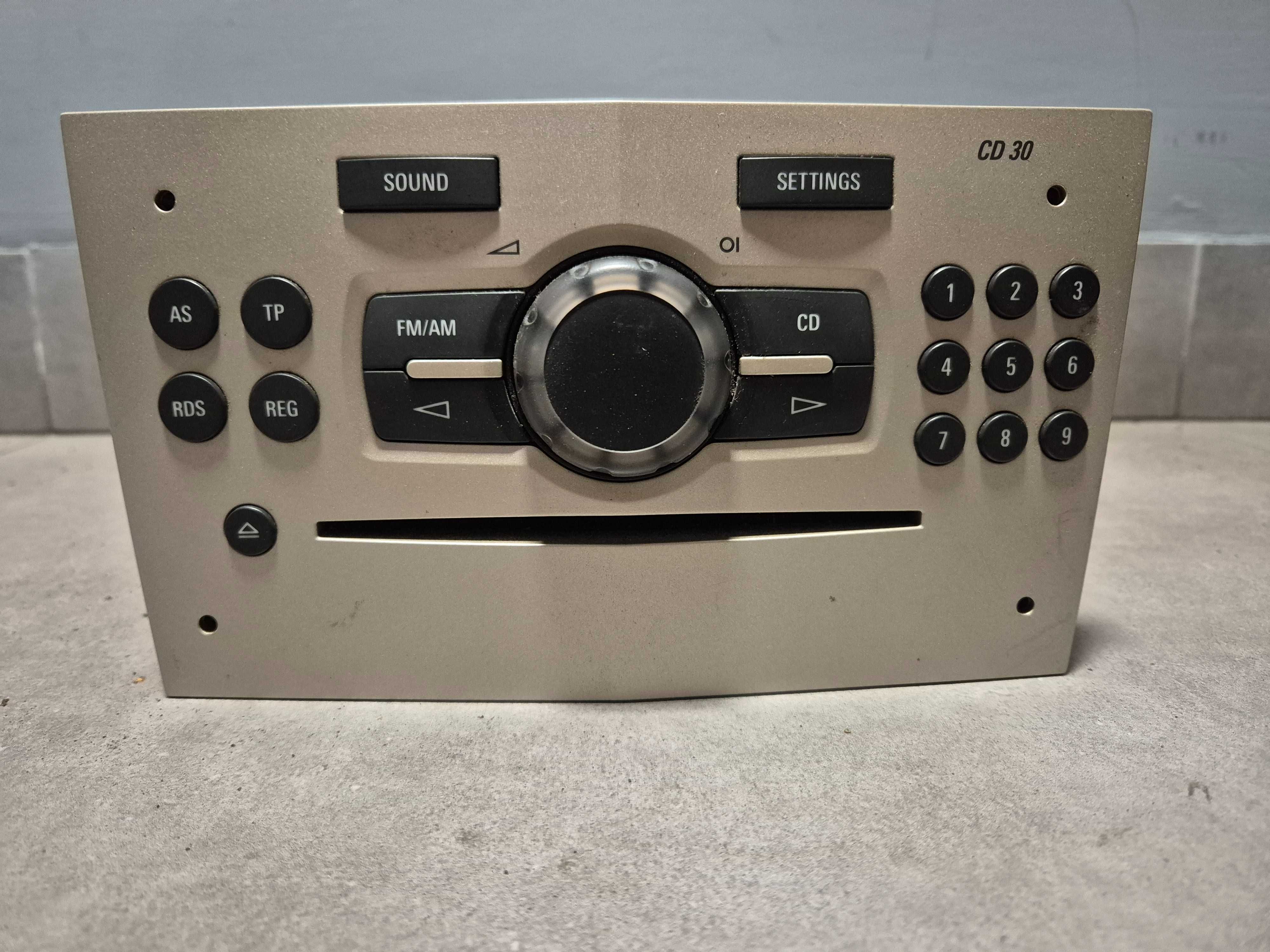 Radio samochodowe fabryczne Opel Corsa D 497.316.088 złote srebrne