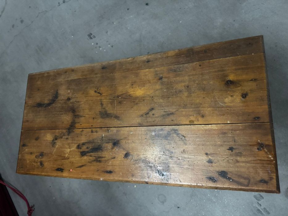 Antique wooden occasional table with a single drawer and tapered legs.