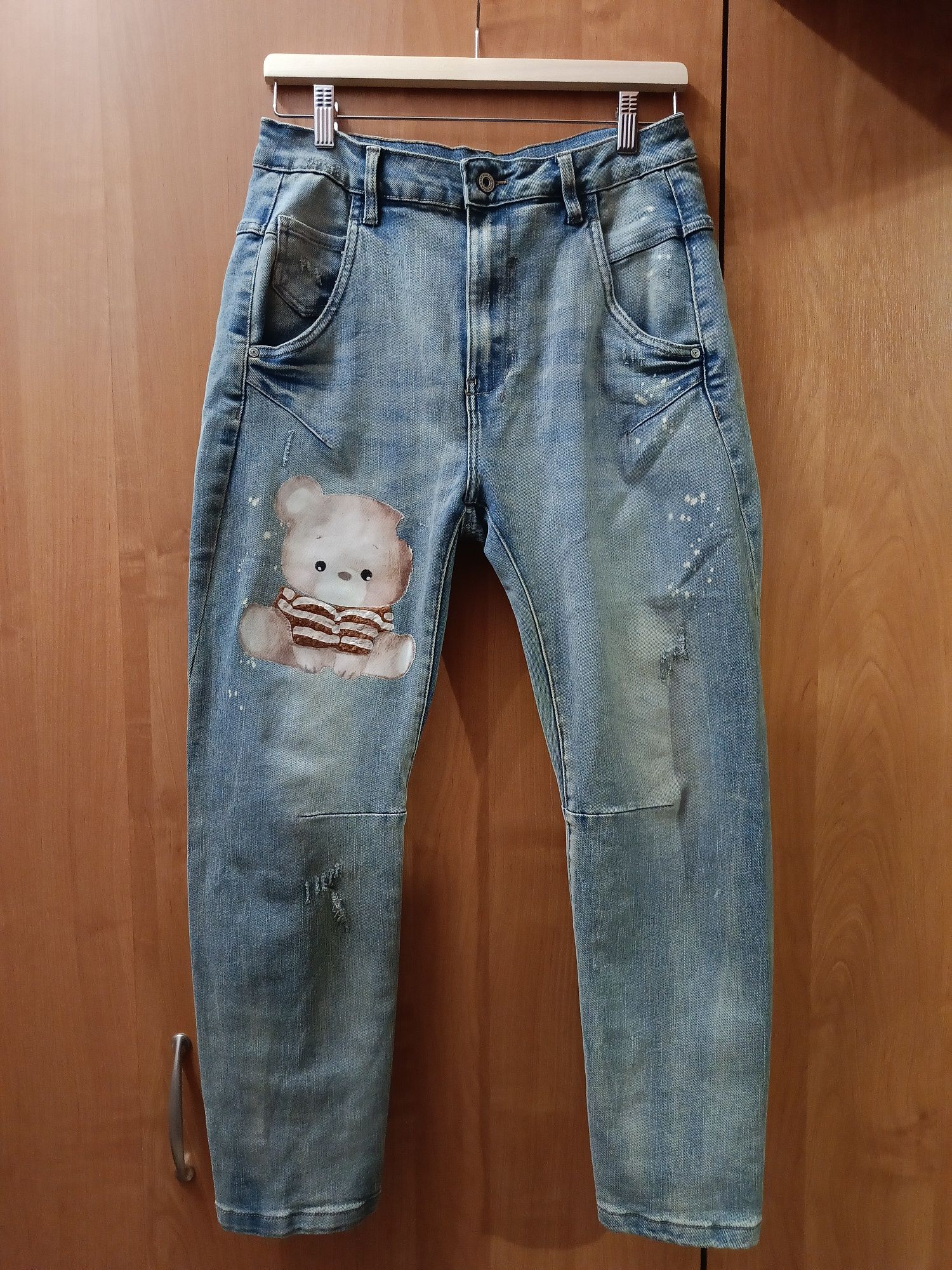 Jeansy  z przetarciami