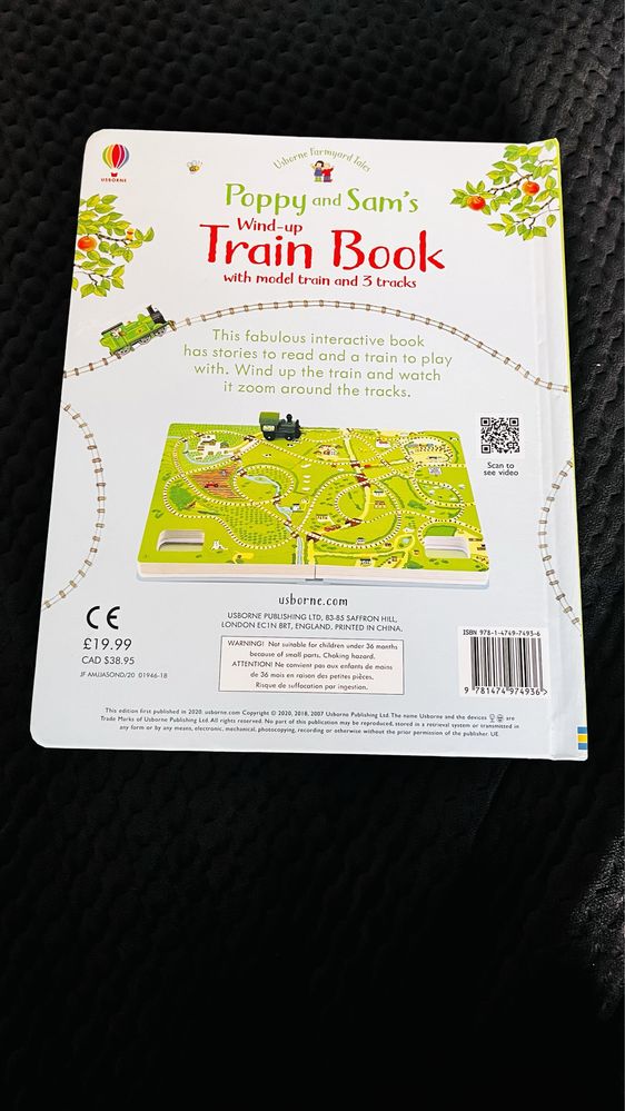 Poppy and Sam’s wind up train book Usborne - książka z pociągiem