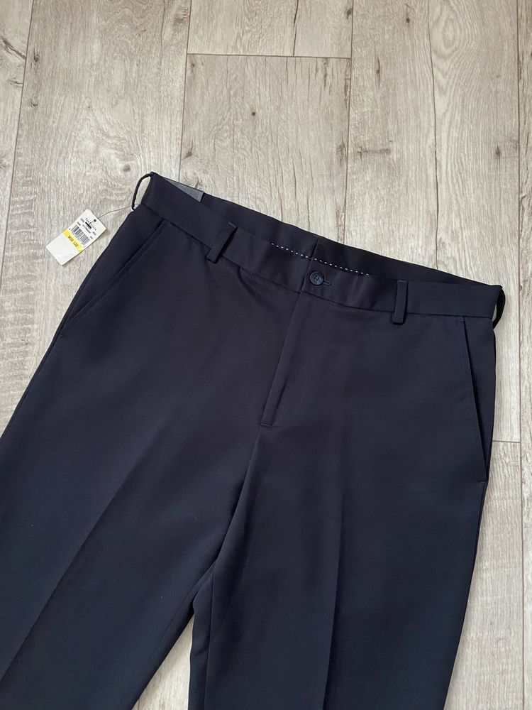 Нові люксові чоловічі брюки van heusen розмір w33 l32