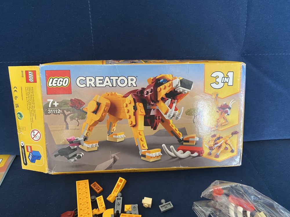 Klocki Lego Creator 3w1 31112 Dzik Lew Struś
