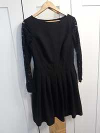 Czarna sukienka koronkowe rękawy
