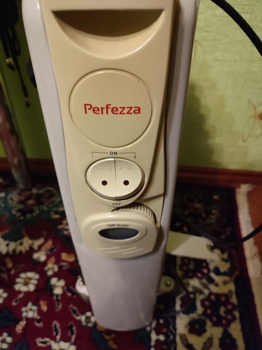 Масляный обогреватель.