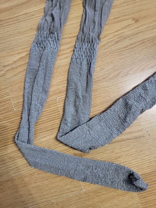 Nowe Marilyn/Gatta rajstopy damskie srebrne brokat prążki