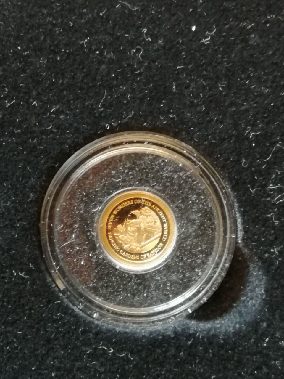 7 szt złotych monet z serii Najmniejsze Monety Świata