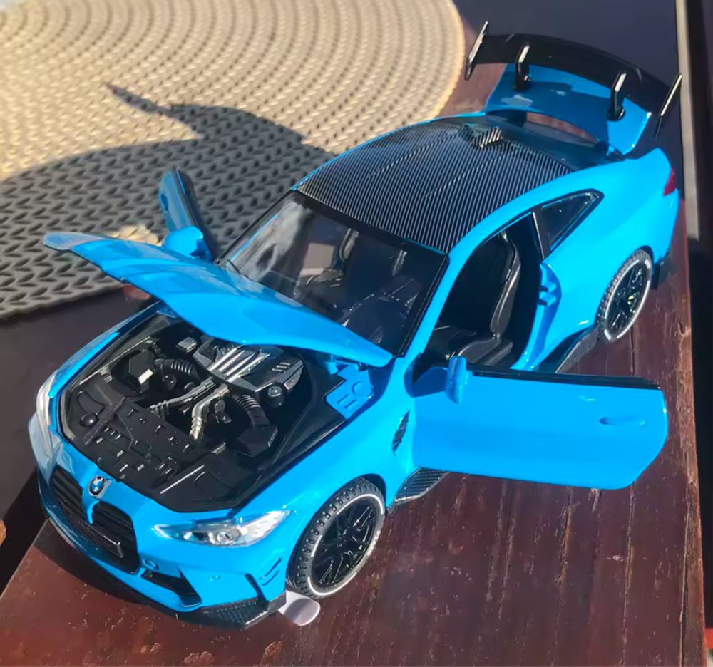 Zabawkowy samochod BMW M4 metalowy niebieski naped światła prezent
