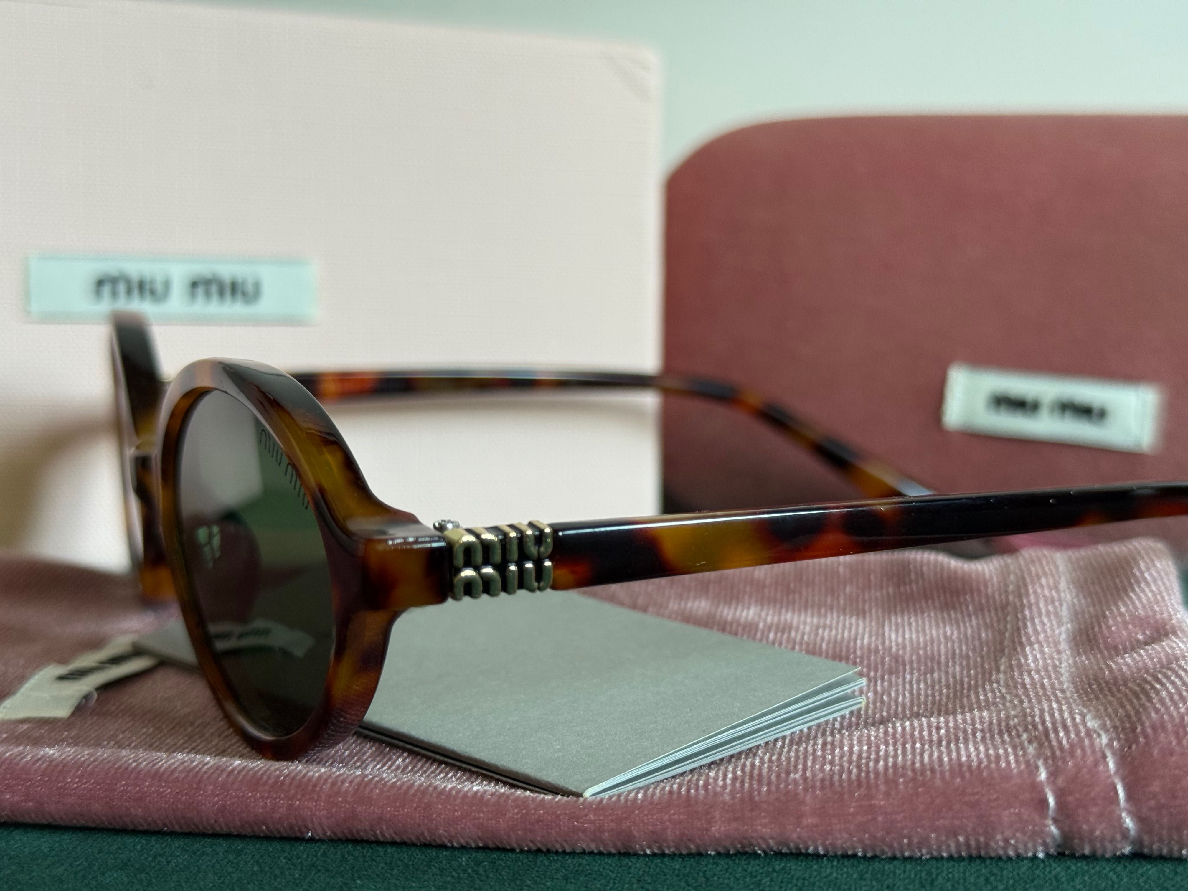 Okulary przeciwsłoneczne z etui nowe Miu Miu panterka hit