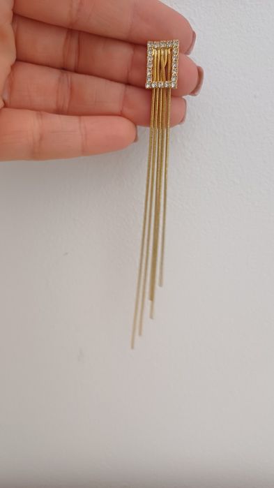 Brincos dourados com pormenor prateado