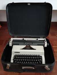 Máquina de escrever antiga, com mala em imitação de pele