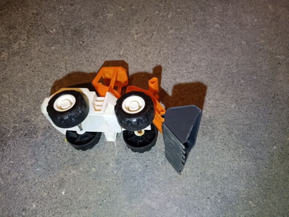 Zabawkowy spychacz ładowarka