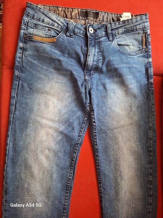 Spodnie jeansy   reserved  rozm. 32/ 34