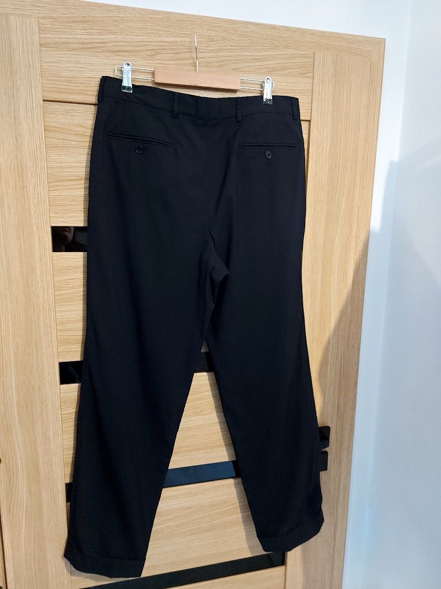 Hugo Boss męskie eleganckie spodnie na kant wełna roz  L