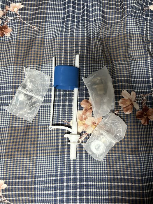 Комплект для  ремонту зливного бачка унітаза.