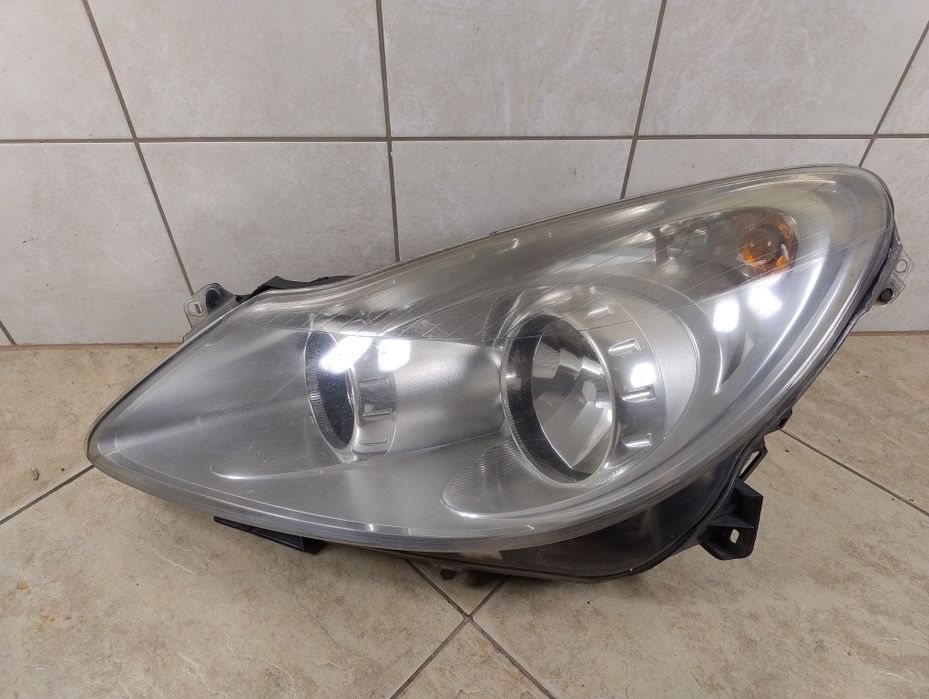 Opel Corsa D 06-11 lampa reflektor przód lewy Europa oryginał wysyłka