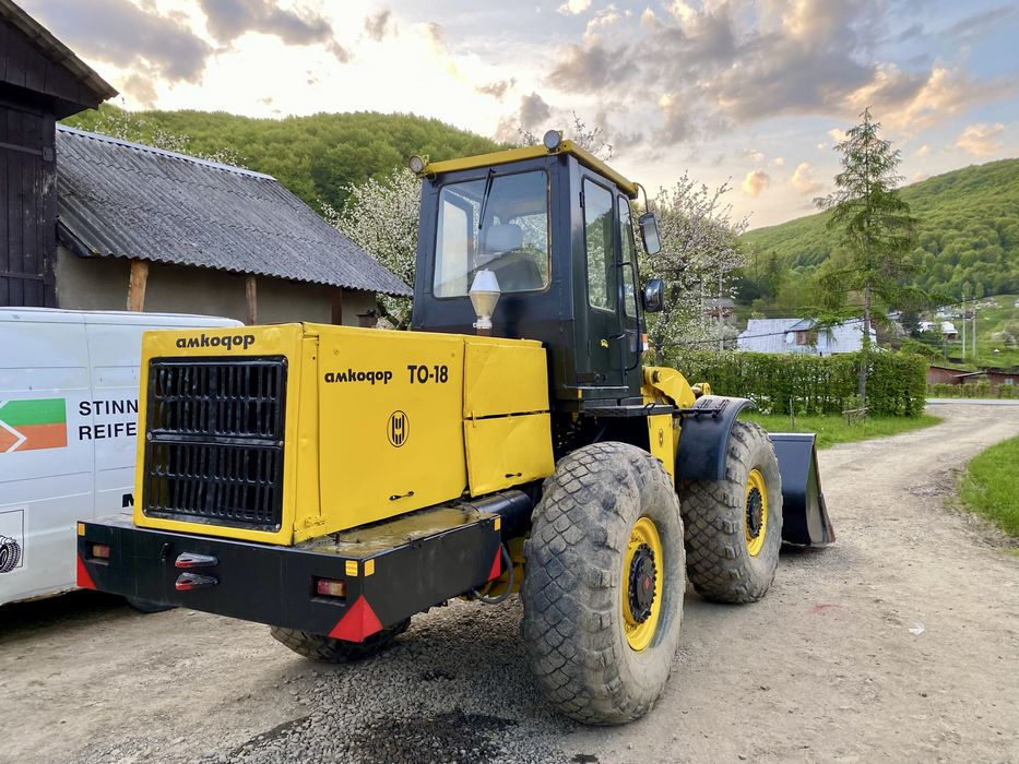 Амкадор ТО-18 навантажувач