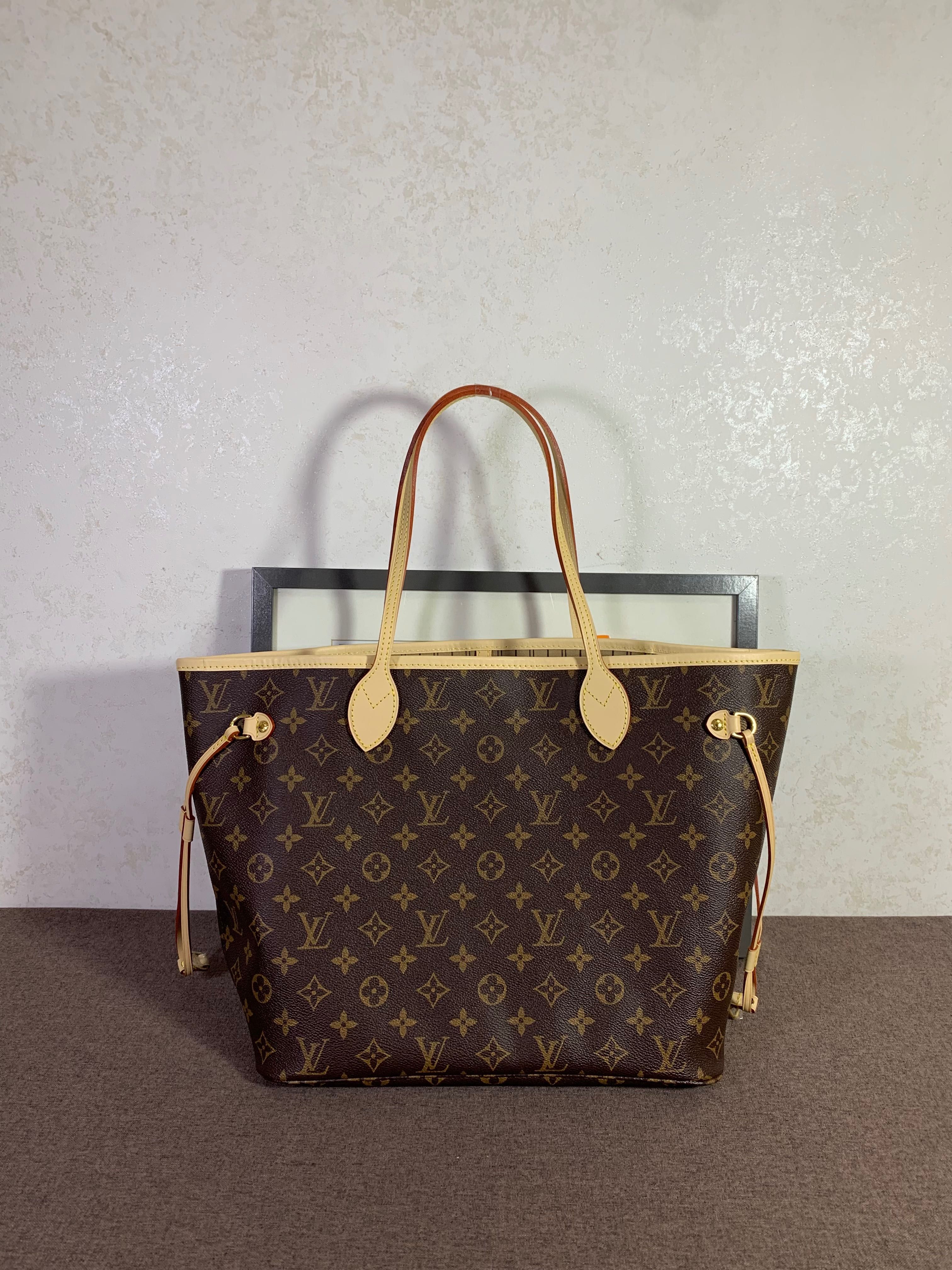 Torebka Louis Vuitton Neverfull MM Monogram brązowa skóra shopper bag