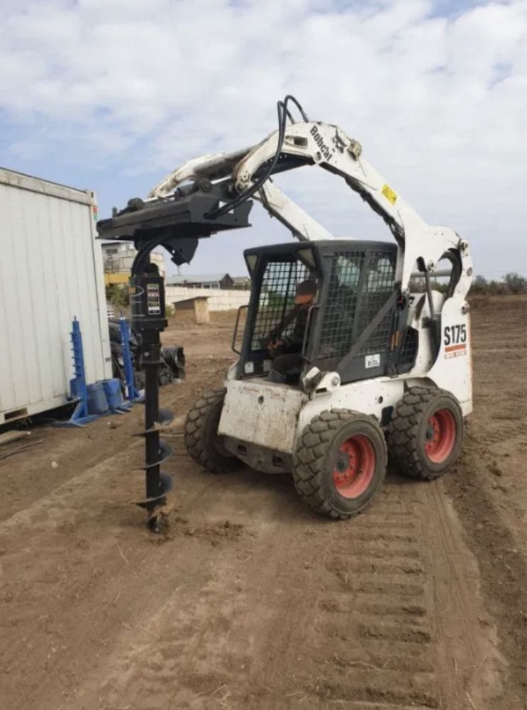 Аренда. Услуги мини-погрузчика Bobcat, ковш,бур,траншеекопатель,вил