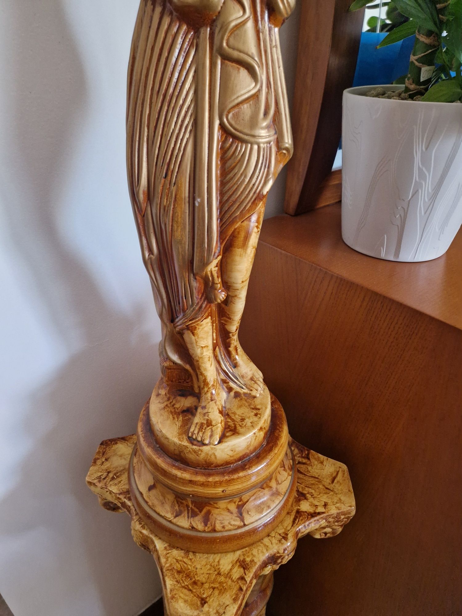 Estátua como nova
