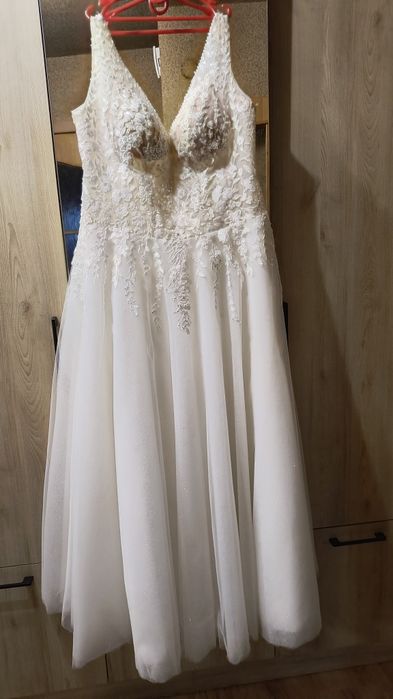 Śmietankowa suknia ślubna