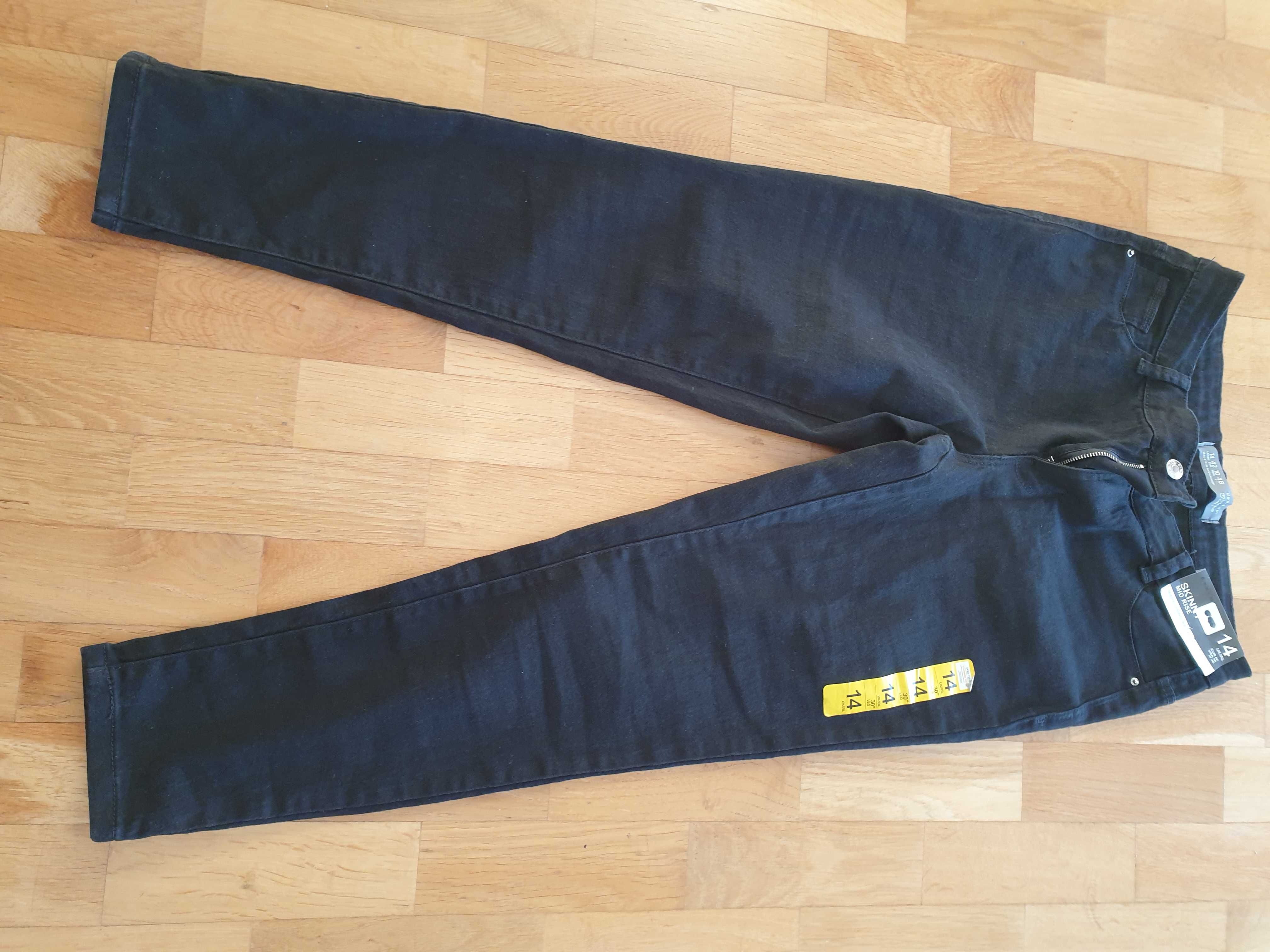 Czarne dopasowane jeansy skinny nowe.