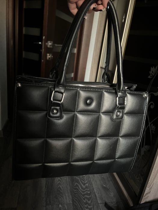 Шкіряна сумка.