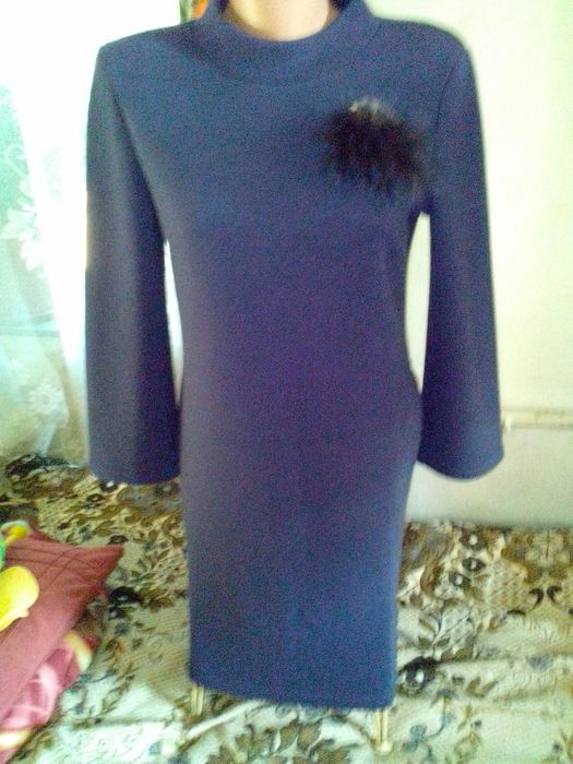 Жіноча сукня і піджаки